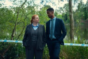 Snapshot of TV programme with two detectives